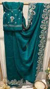 Embroidered teal green saree with scalloped edge