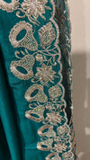 teal green crepe chiffon saree with scalloped silver border